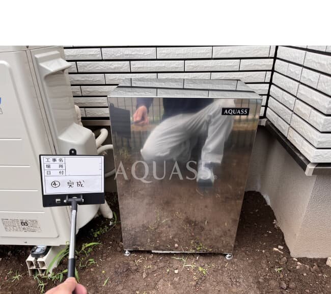 戸建て用ステンレス製カバーを設置し工事が完了した様子